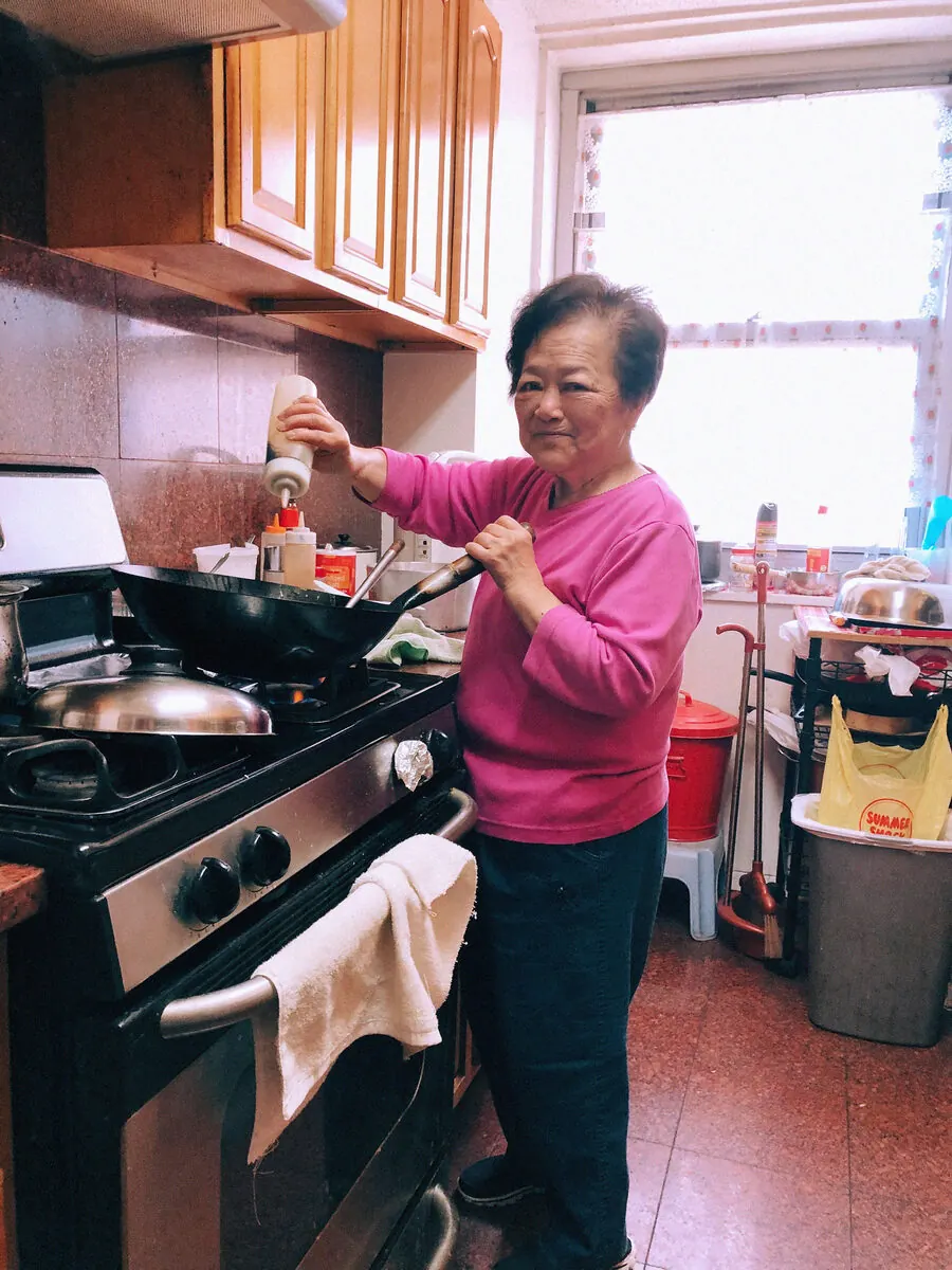 Cooking with a wok in a home kitchen